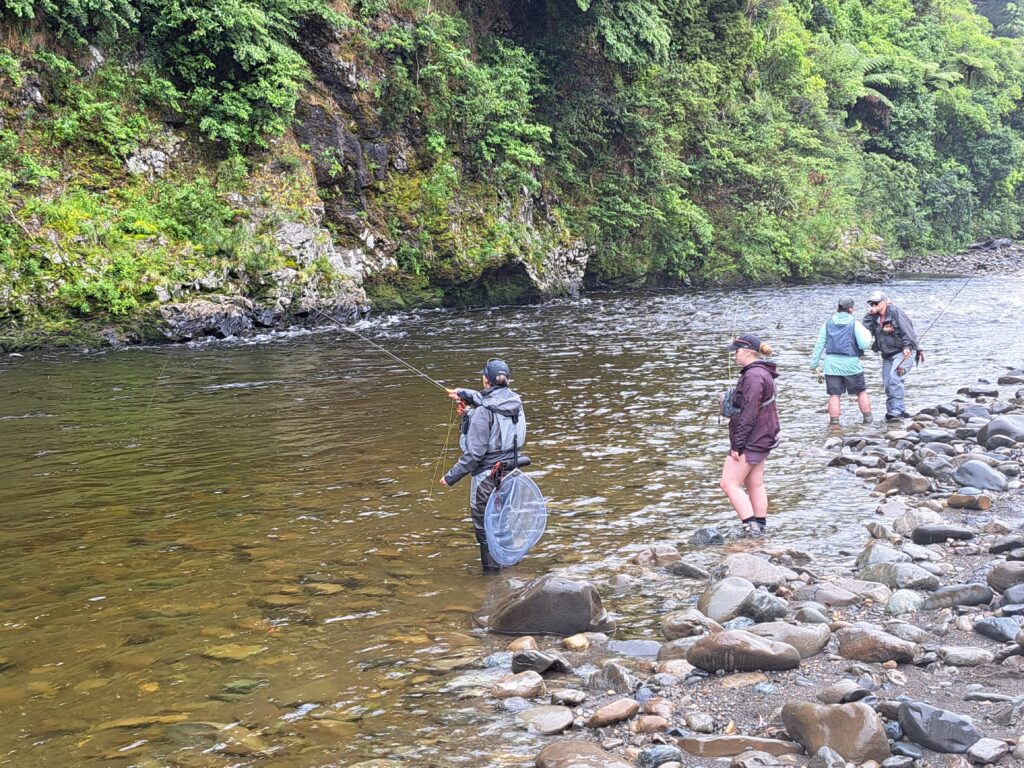 Learning from an expert on how to fish the Hutt River during the 2022 Women on the Fly Workshop.